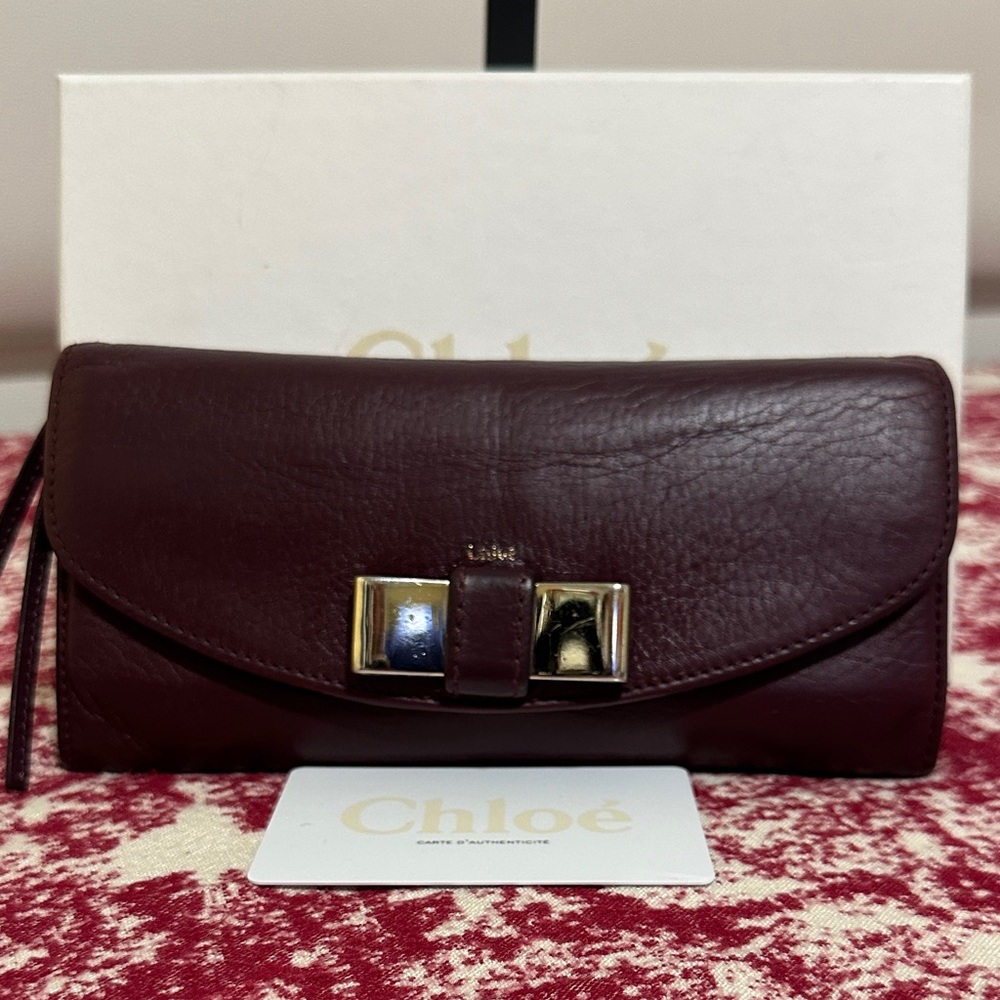 Chloé Deep Burgundy Leather Wallet with Gold Bow Accent